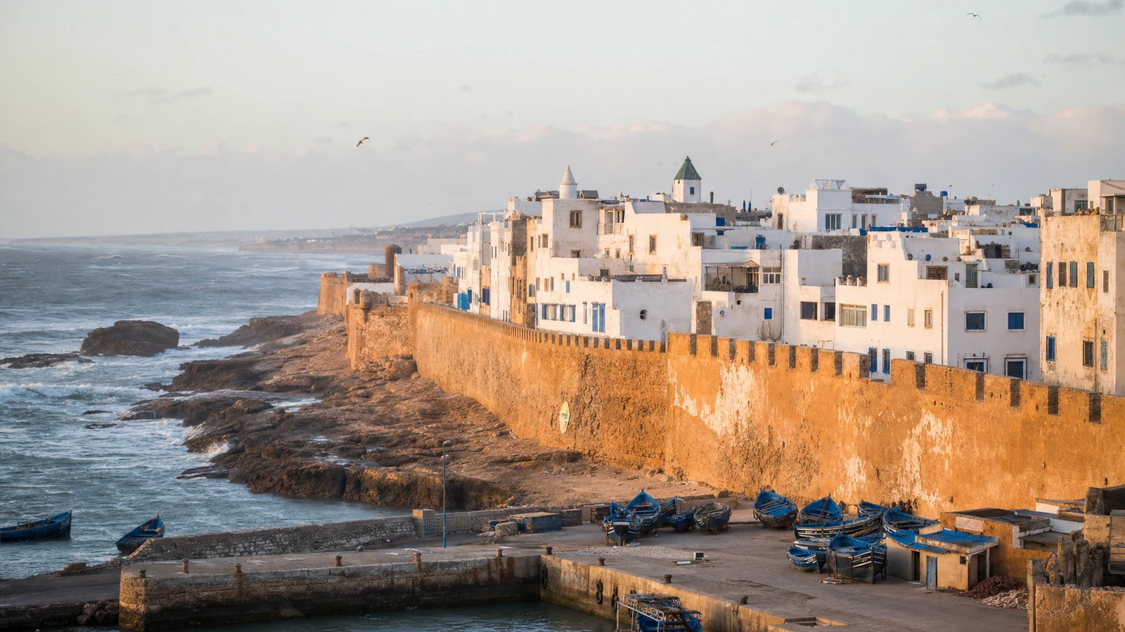 Essaouira medina, ramparts and blue fishing boats beside the Atlantic
