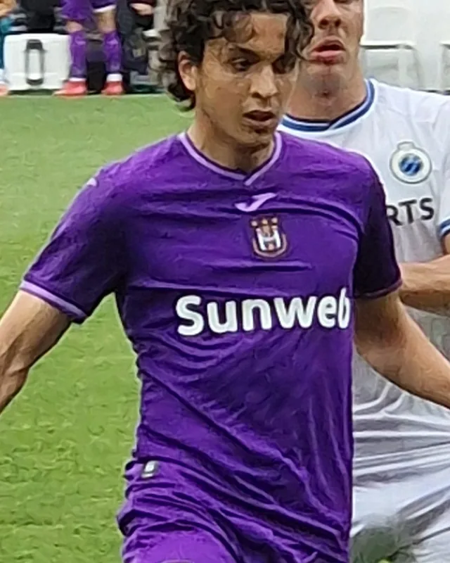 Ali Maamar playing in a purple club football shirt