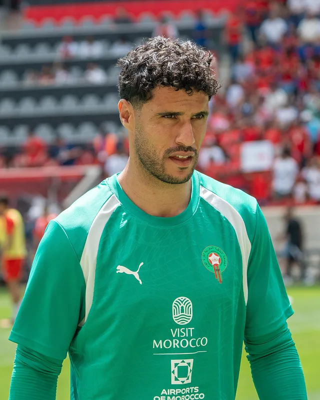 Munir El Kajoui in a green Morocco goalkeeper jersey