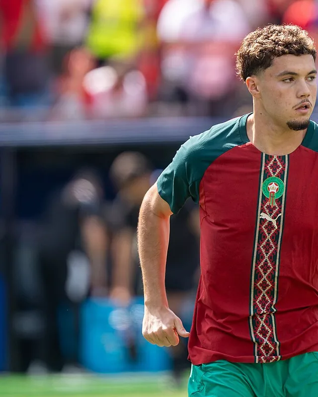 Samir El Mourabet wearing Morocco's red and green national-team shirt
