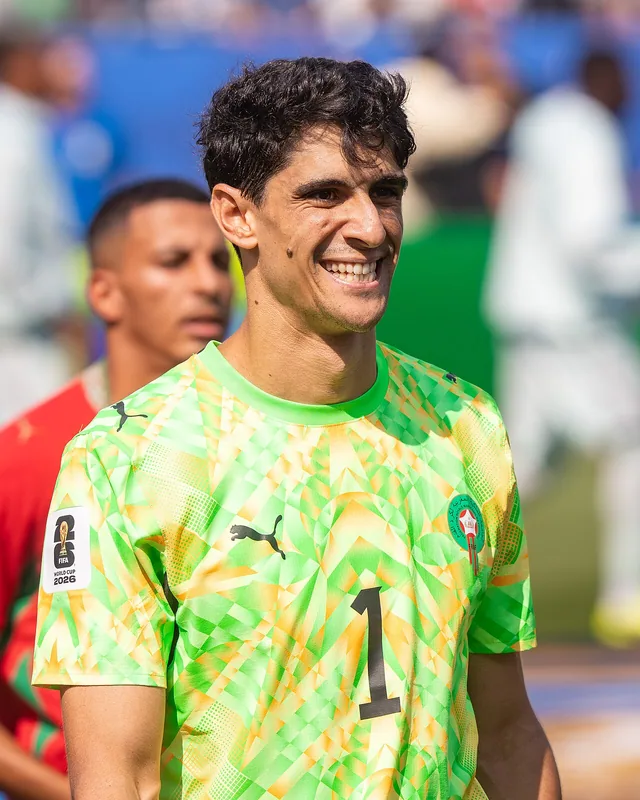 Yassine Bounou smiling in Morocco goalkeeper kit at the 2026 World Cup