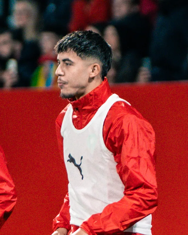 Yassir Zabiri wearing a white training bib over Morocco team clothing