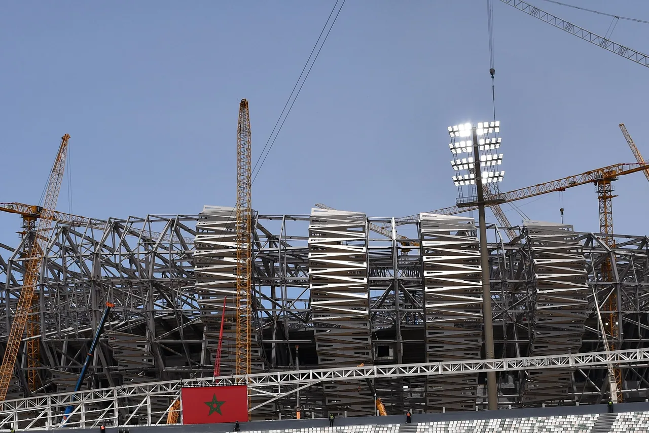 Curved steel roof and facade of Prince Moulay Abdellah Stadium under construction in Rabat in May 2025